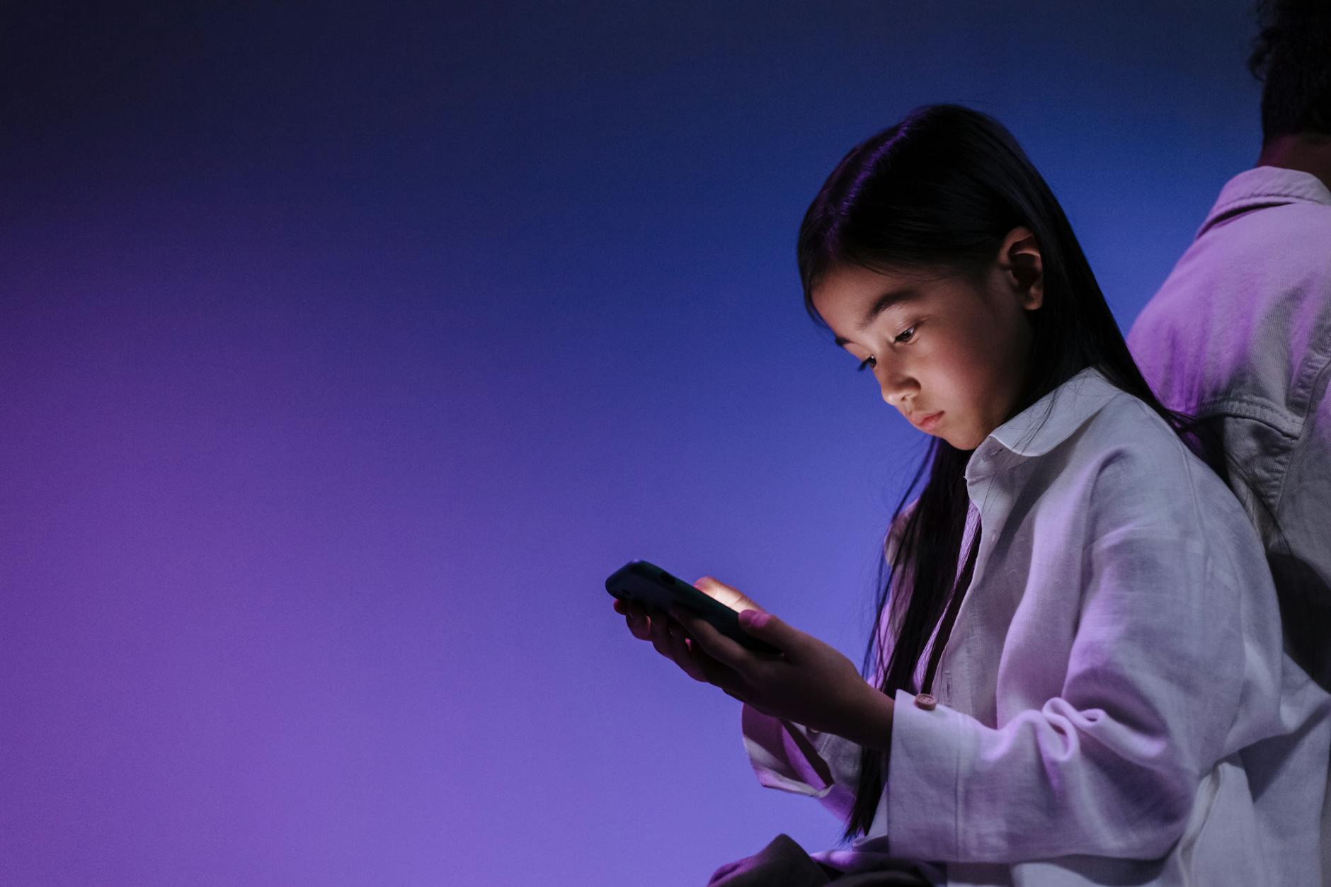 young girl using a smartphone